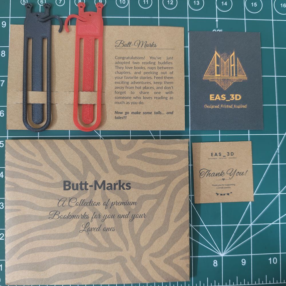 The Butt-Marks bookmark set in kraft packaging with a thank-you card